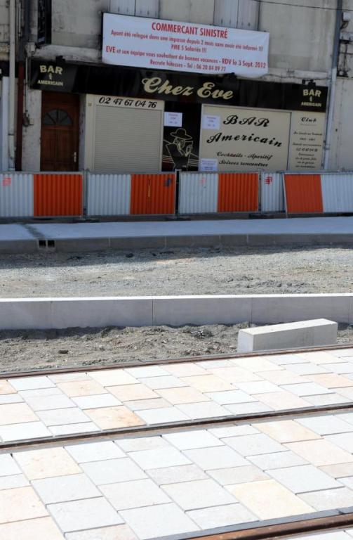 Au secours, Super-Mufle, le petit commerce est en danger!